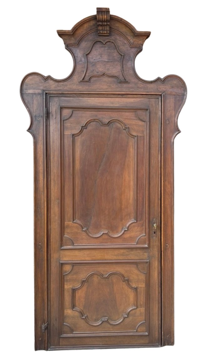 Lombard-style Walnut Door With A Contoured Frame