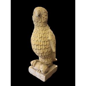 Sculpture Depicting A Bird Of Prey Holding A Snake Between Its Paws 