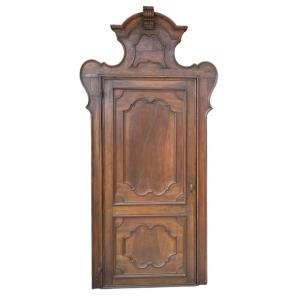 Lombard-style Walnut Door With A Contoured Frame