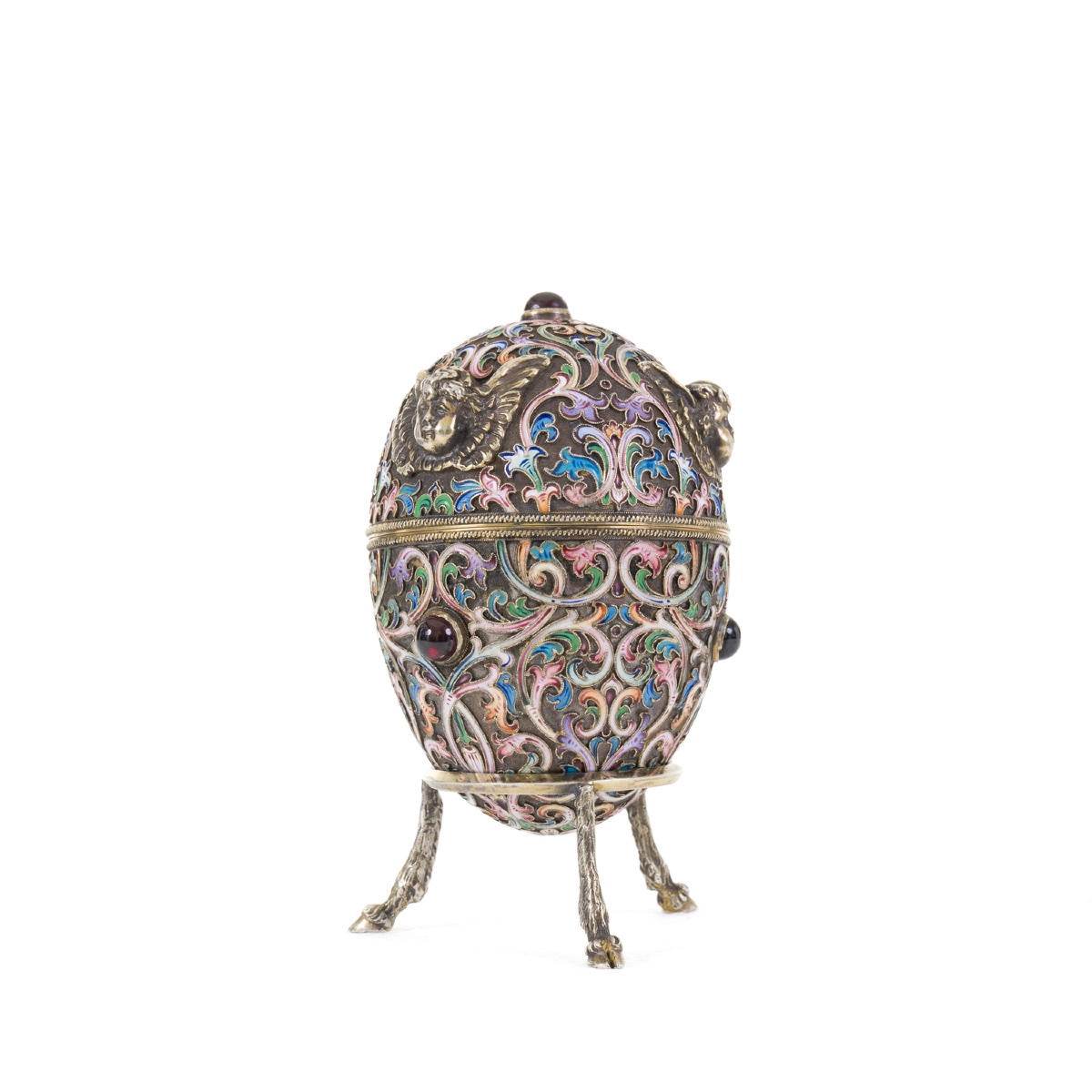 An Egg With Cloisonné Enamel Decoration And Angel Heads