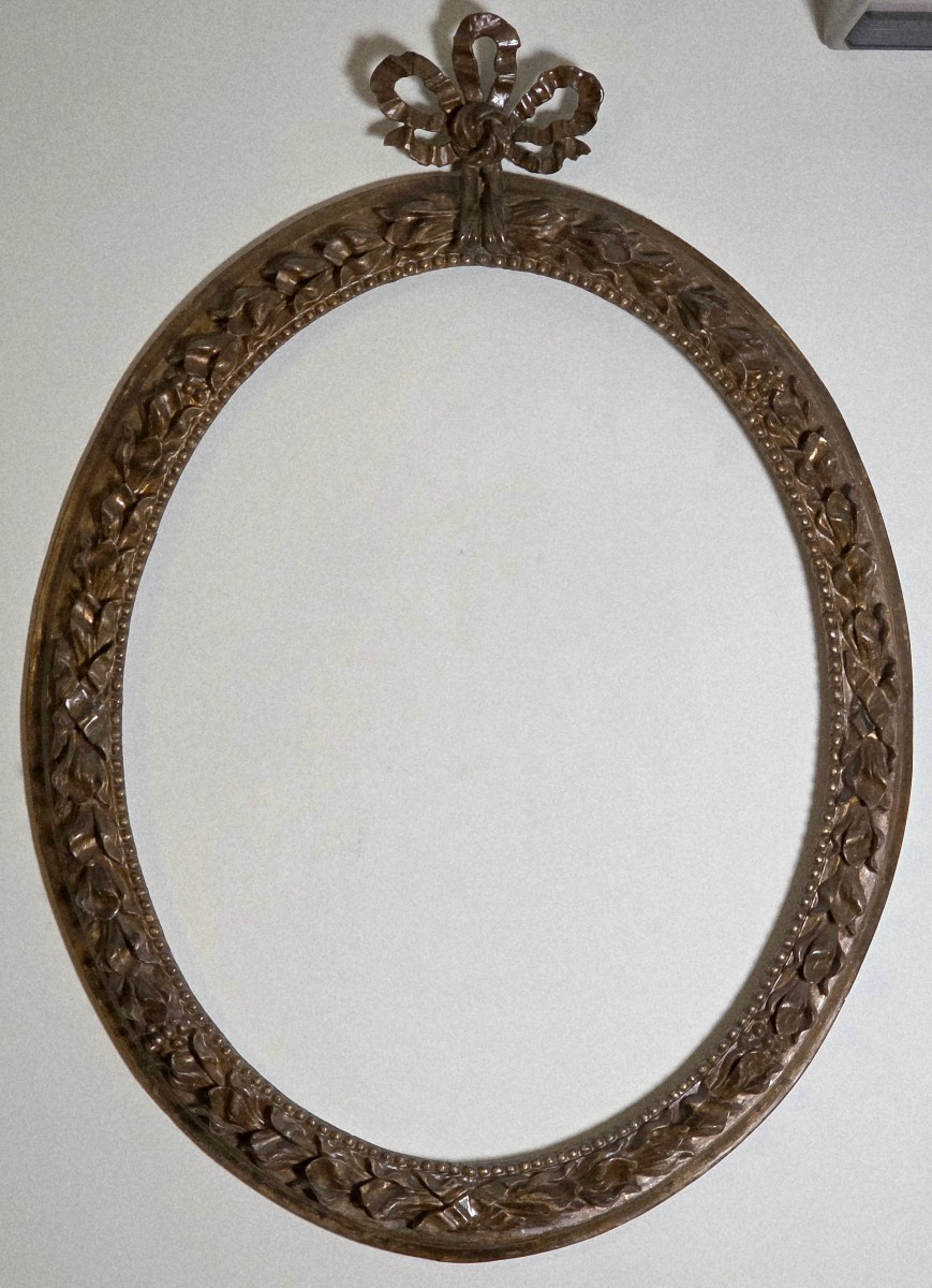 Grand cadre ovale émilien Louis XV–XVI sculpté, argenté et meccato, milieu du XVIIIe siècle