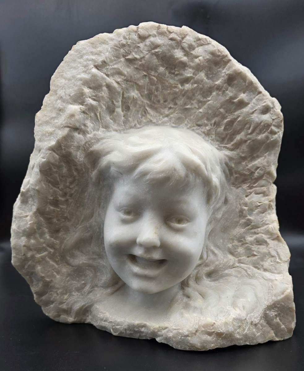 White Marble Sculpture Of A Child’s