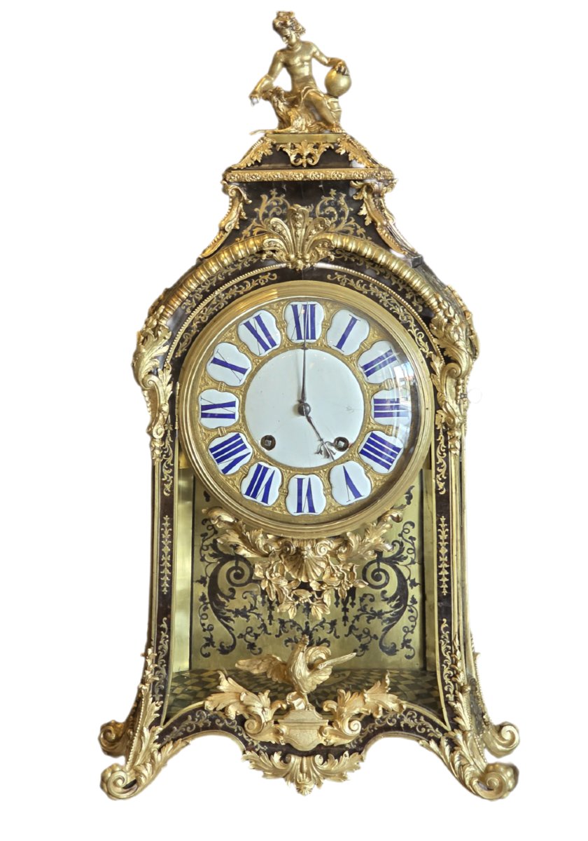 French Louis XV Cartel Pendulum Clock In Ebonized Wood And Gilded Bronze, 18th Century