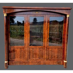 French Empire Bookcase From The Early 19th Century In Solid Wood Veneered In Flamed Mahogany