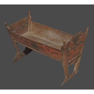 A Beautiful Walser Cradle Made Of Painted Wood And Richly Carved, Early 19th Century