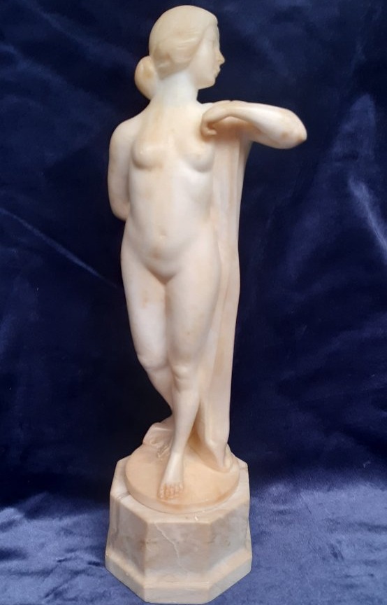 Alabaster Figurine Of A Woman, 20th Century.