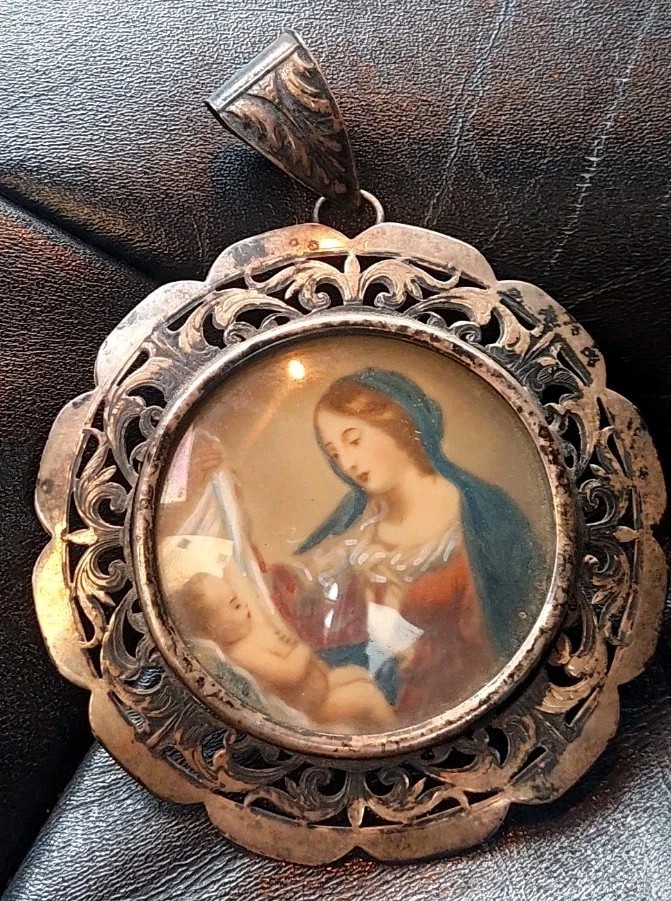 Painting Of The Madonna And Child In A Perforated Silver Frame-photo-4