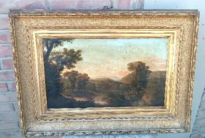 An Antique Painting On Canvas Depicting A Bucolic Landscape