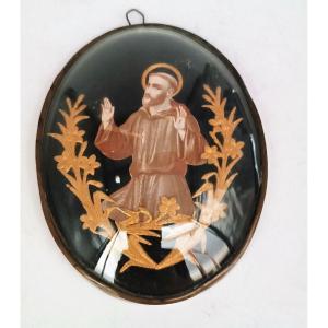 Ex-voto With Golden Lace Effigy Of Saint Francis. 19th Century Convex Glass