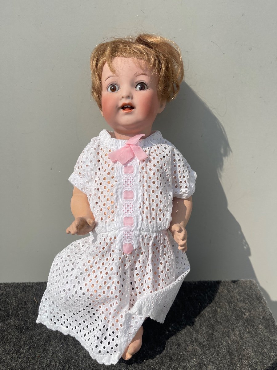 Doll With Bisque Head, Moving Eyes And Papier-mâché Body. Signature Heuback, Germany. 