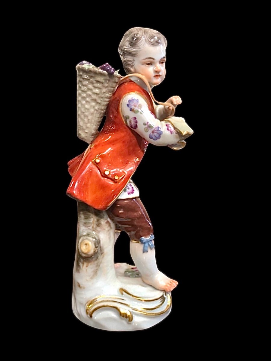 Porcelain Figurine With Male Figure With Basket. Meissen. 