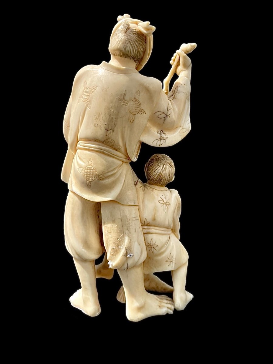 Ivory Okimono Sculpture With Male And Child Character. -photo-1