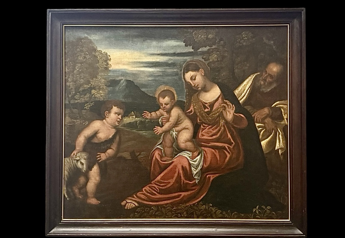 Huile sur toile représentant la Sainte Famille avec saint Jean enfant. 