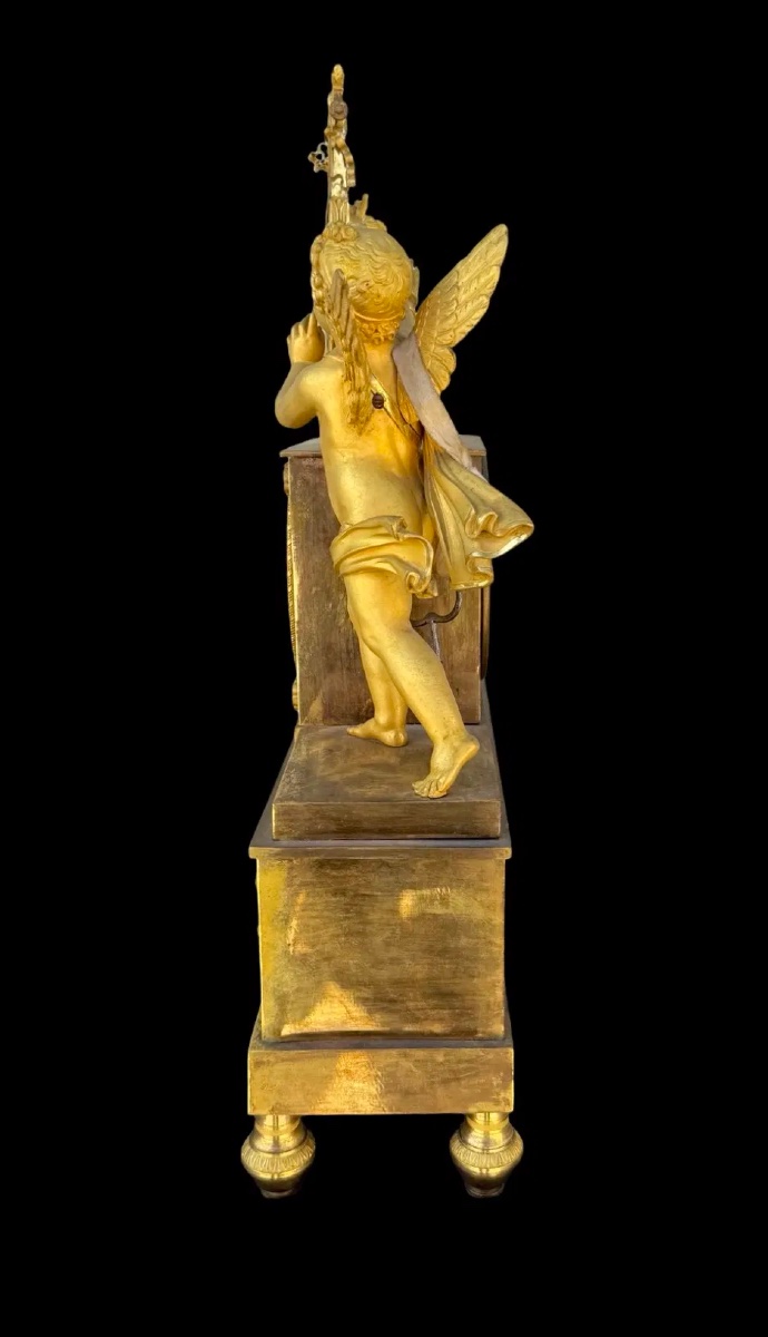 Pendule en bronze doré à mercure représentant Cupidon jouant de la lyre. Manufacture Dhalström,-photo-3