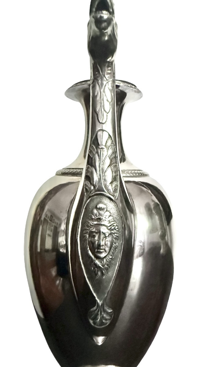A Silver Coffee Pot With A Pear-shaped Body Resting On A Circular Base Adorned With Lanceolate Leaves.-photo-4