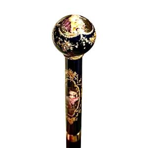 Evening Stick With Ebony Barrel And Porcelain Knob Painted With Female Figures. Sevres, France.