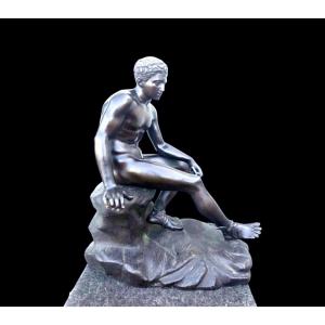 Bronze Sculpture Depicting A Seated Mercury. 