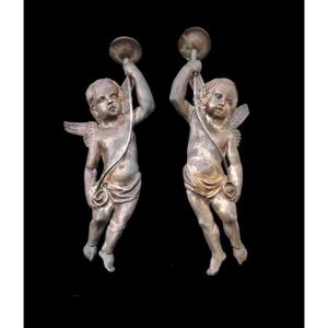 Pair Of Silver-plated Copper Applique-candlesticks Depicting Angels. 