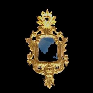 Mirror In Carved Wood With Plant Motifs, Rocaille And Gold Leaf.venice.