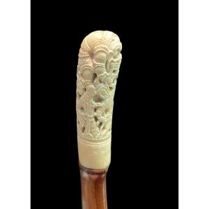 Stick With Pierced Ivory Knob With Characters And Plant Motifs, Bamboo Cane. 