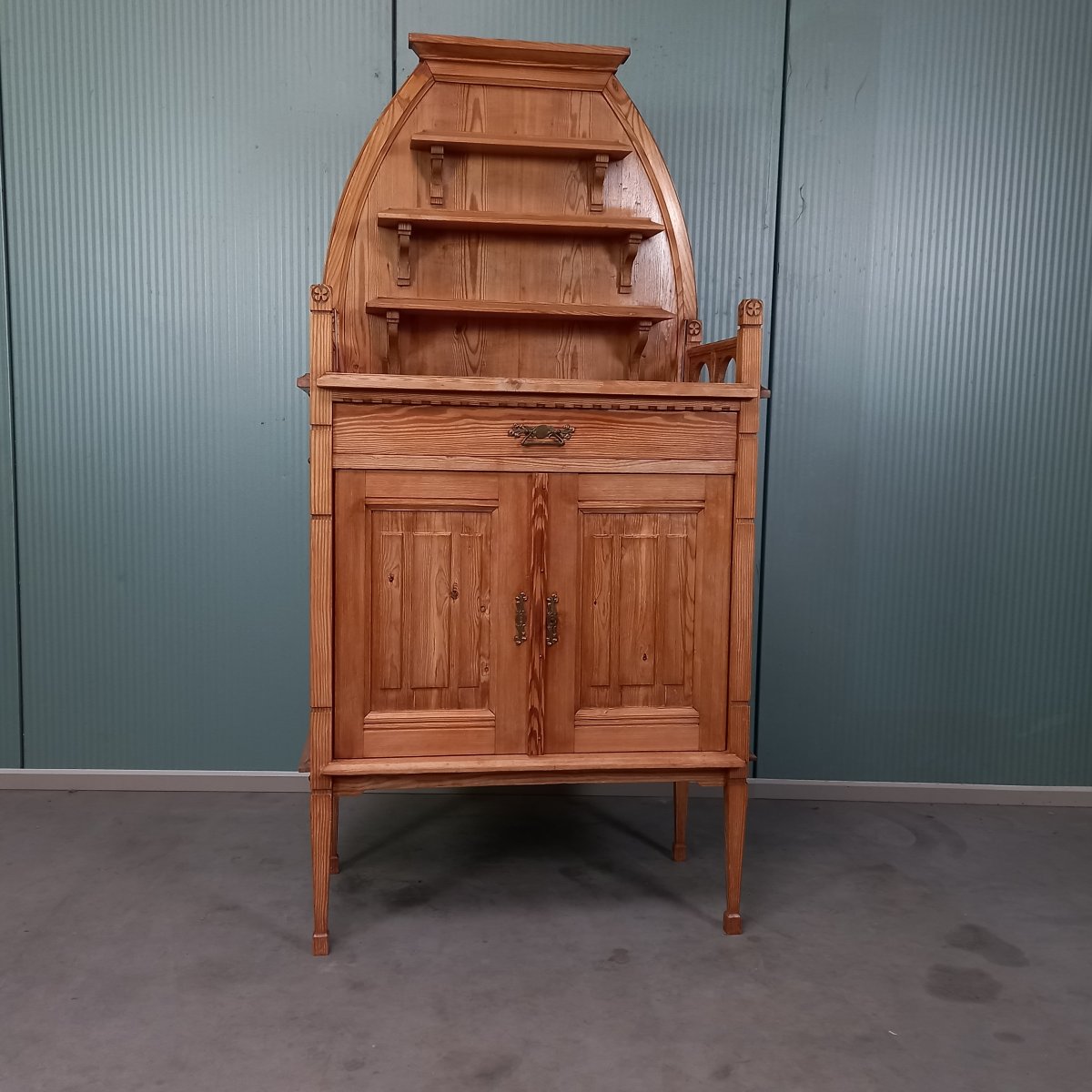 A Unique Piece Of Furniture Made Of Pine With Wood Carvings