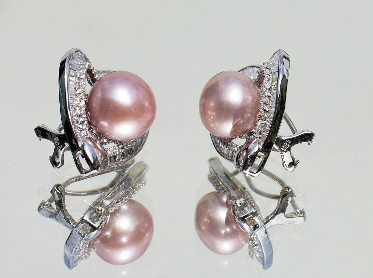 Pair Of Silver And Pearl Earrings-photo-2