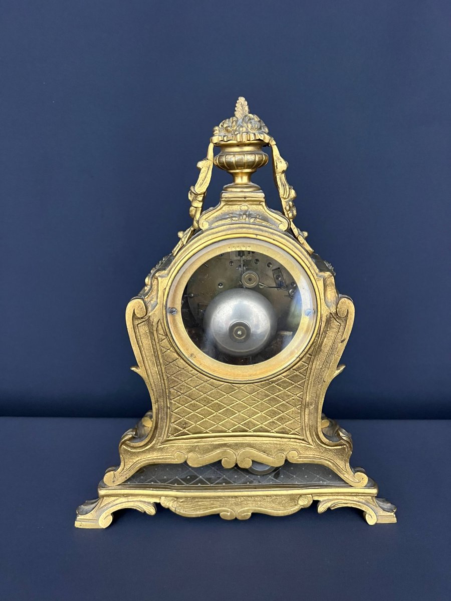 Pendule de style Louis XV en bronze doré-photo-1