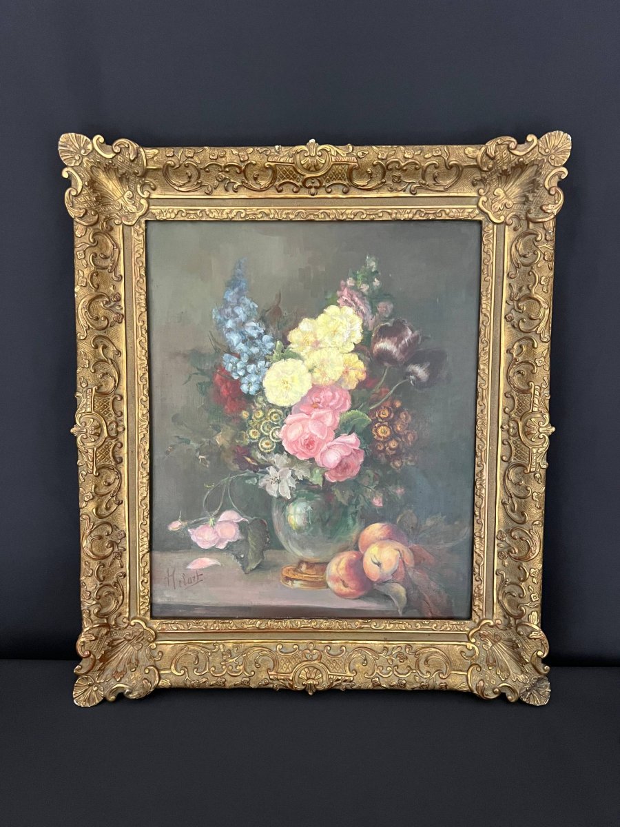 Nature morte aux fleurs et aux pêches, huile sur toile signée 