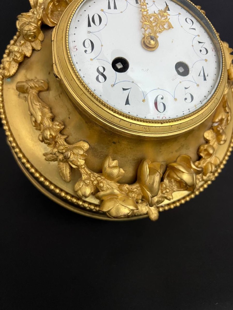 Pendule murale œil-de-bœuf en bronze doré, style Louis XVI -photo-1
