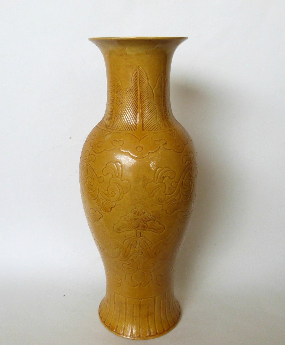 Chinese Porcelain Vase With Incised Decoration On A Yellow Background -photo-1