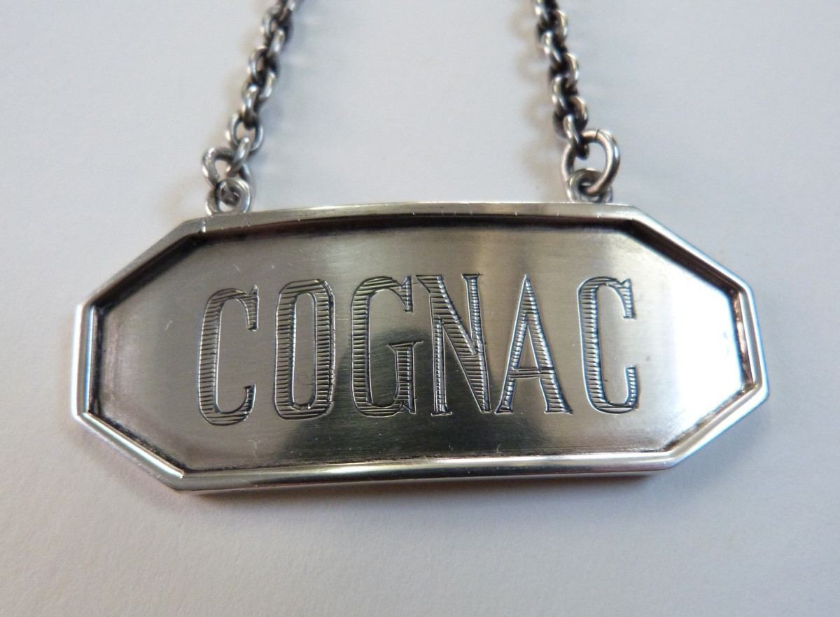 Etiquette en argent massif Cognac Inde Raj Britannique Hamilton & Co