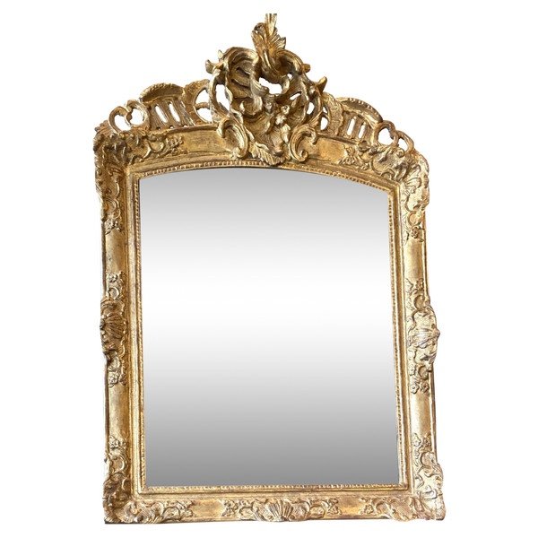 Miroir en bois sculpté et doré d’époque Régence 18ème 