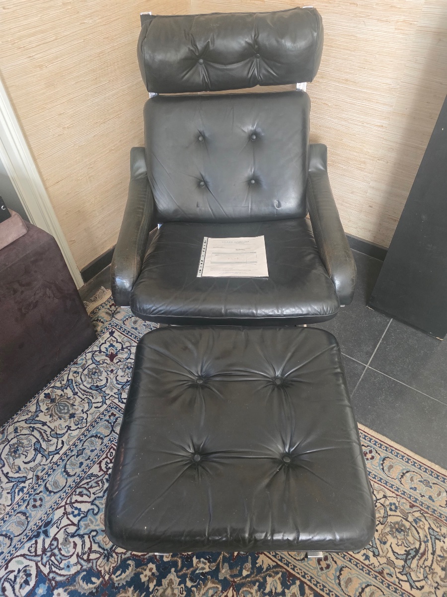 Fauteuil en cuir et acier