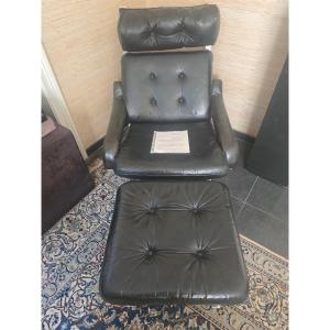 Fauteuil en cuir et acier