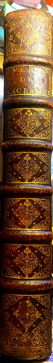 In folio, 1705 ,à Lyon :"Commentaires Historiques et Dogmatiques sur les Sacrements ",G. Juenin