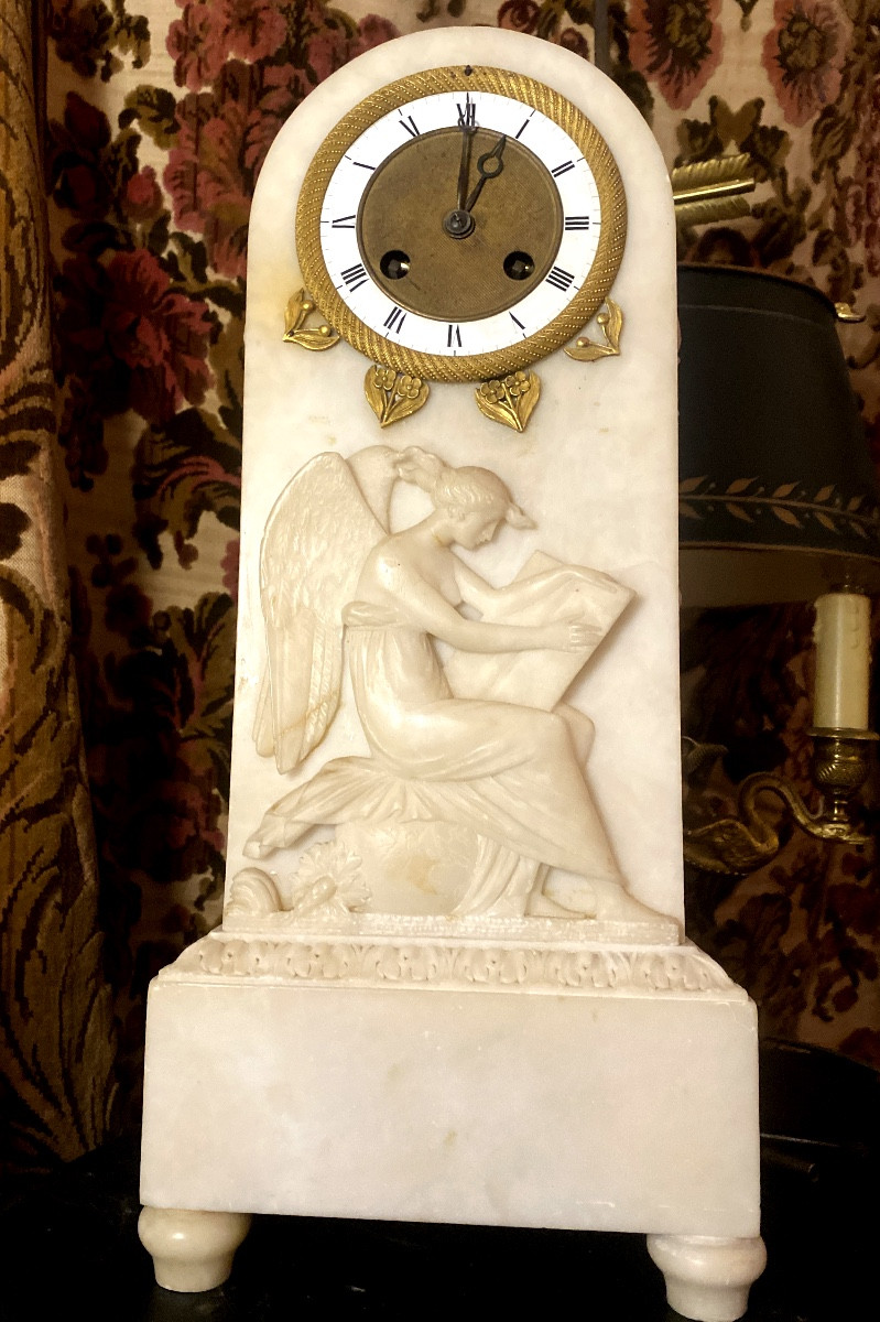 High-quality Charles X Period Carved Alabaster Clock With A Wheel-shaped Enamel Dial And Bronze