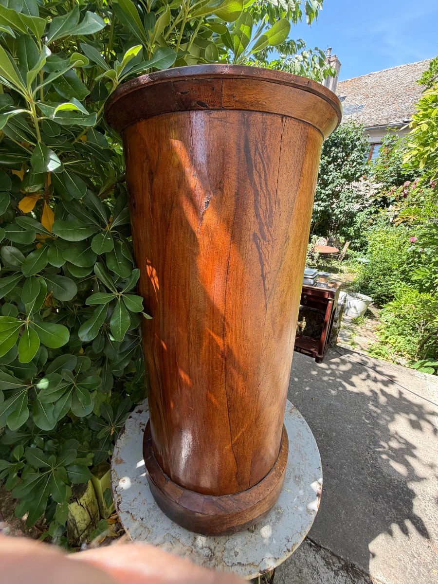 A First Empire-style Nightstand In Light Walnut, Featuring A Drawer And Door, For This Simple 19th-century Column-style Nightstand