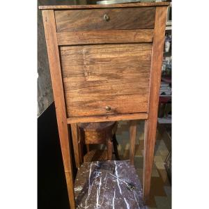 Simple 18th Century Bedside Table In Directoire Style: All In Blond Walnut With Covered Legs, A Curtain And Drawer
