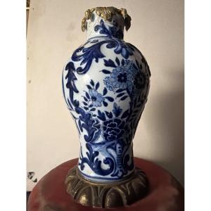 Small Blue-and-white "delft" Earthenware Vase With Raised Patterns, Rimmed In Bronze; 18th Century