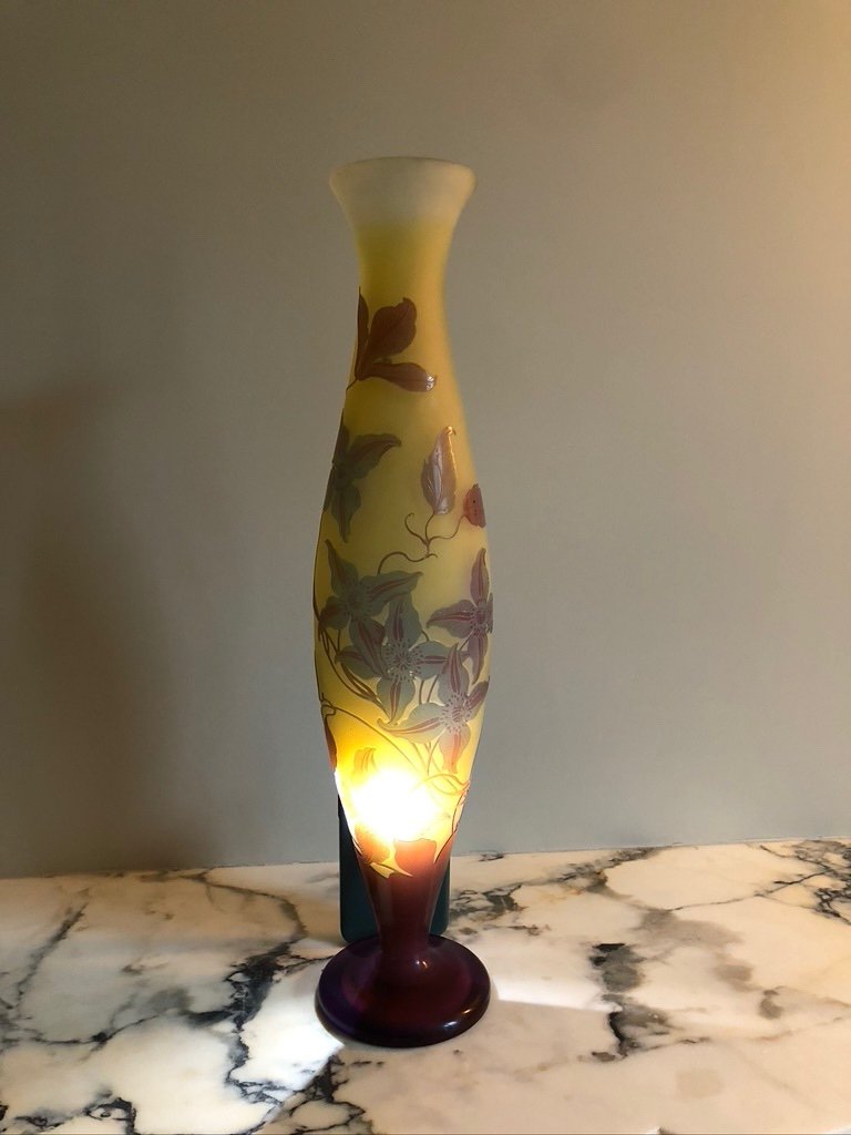 Gallé Vase With Blue Clematis On Yellow Background-photo-2