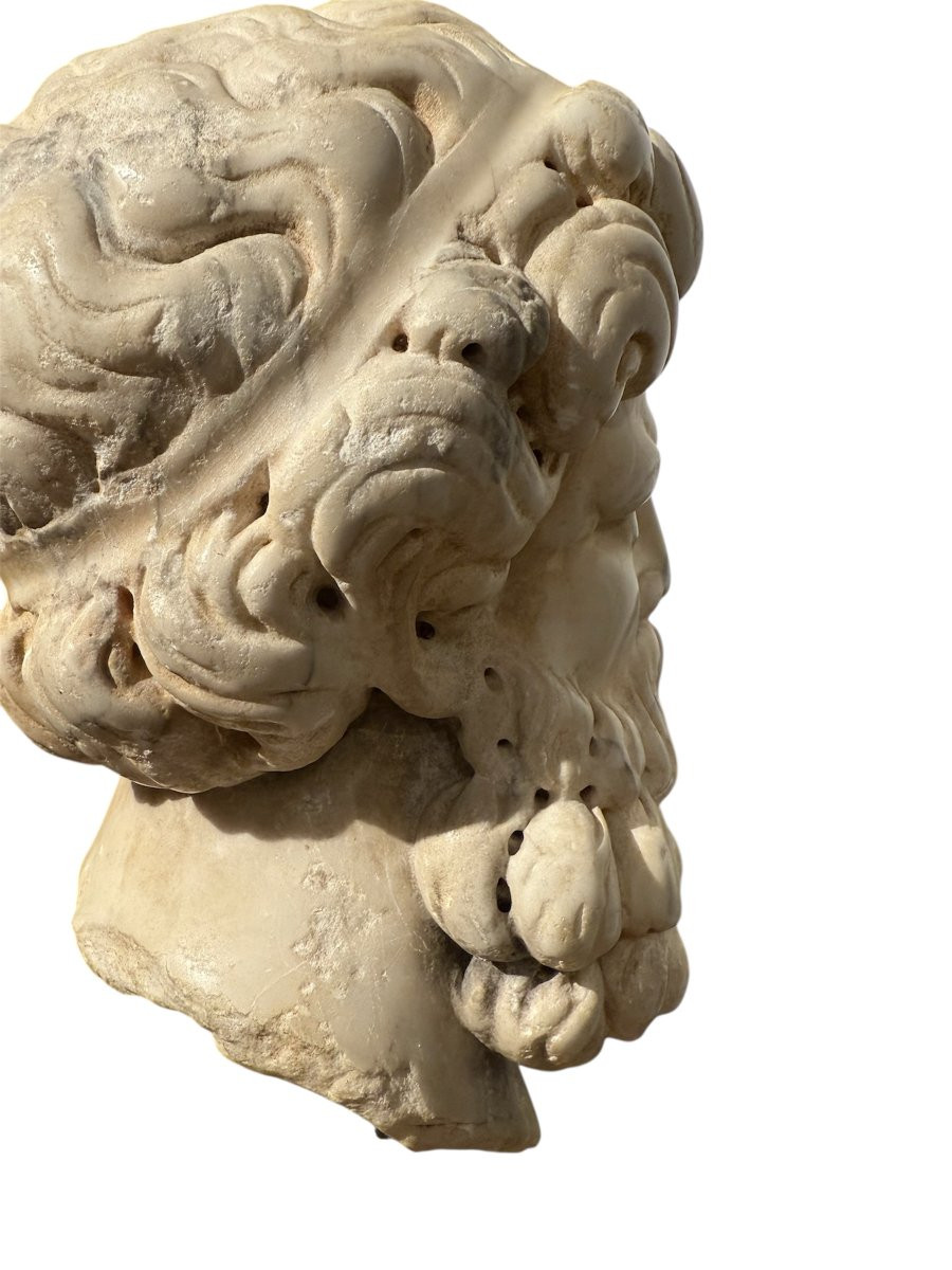 Bearded Male Head In White Marble-photo-1
