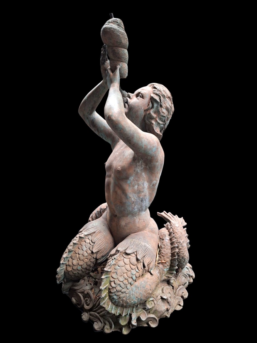 Bronze Fountain Of A Mermaid.