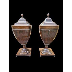 A Pair Of Covered Urns
