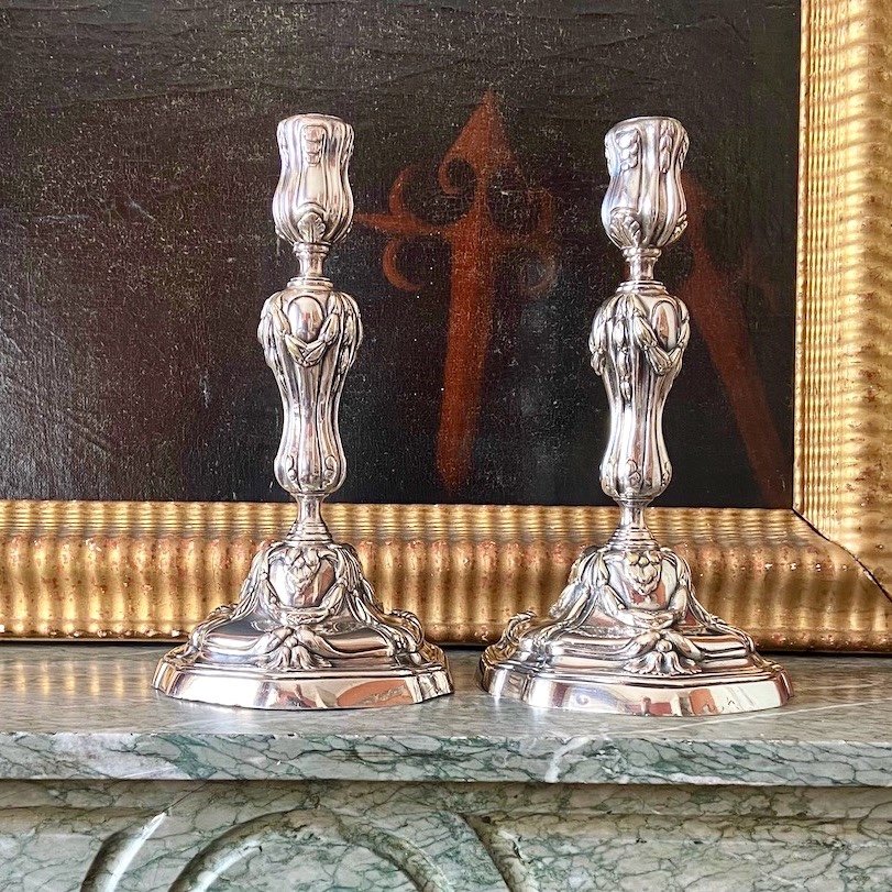 Pair of silver bronze baluster candle holders. 18th century