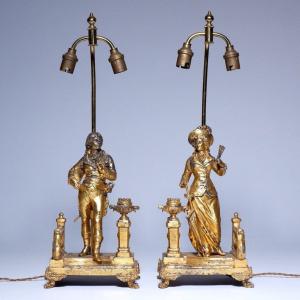 A Pair Of Distressed French Lamps.