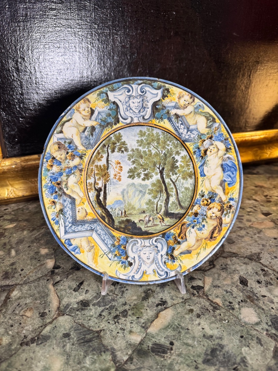 Assiette en faïence Castelli à décor champêtre, Carlo Antonio Grue, début du XVIIIe siècle