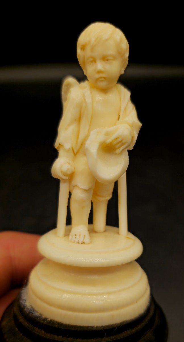 19th Century Antique Ivory Sculpture – Begging Putto On Ebonized Wooden Base-photo-2