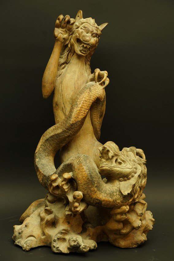 A Lion Fighting A Dragon, Root Sculpture, Indonesia, 20th Century.