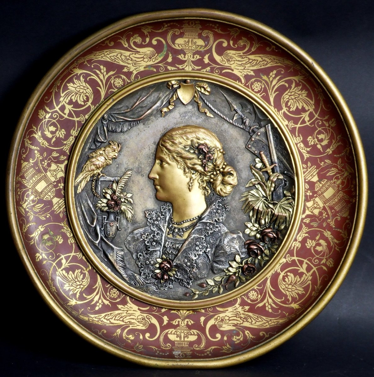 Decorative Plate Depicting A Woman's Profile, Gilded Copper, Late 19th Century.