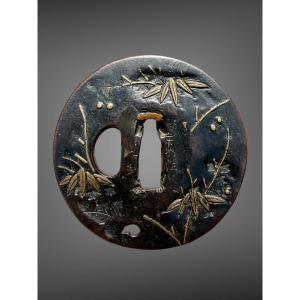 Tsuba maru-gata en fer forgé à motifs de bambous - Période Edo (1603-1868).